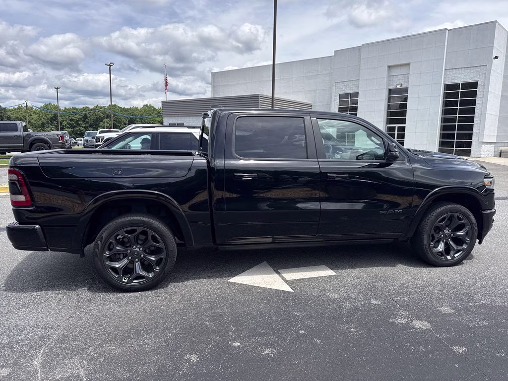 2023 Diamond Black Crystal Pearlcoat Ram 1500 Limited 4X4 Truck