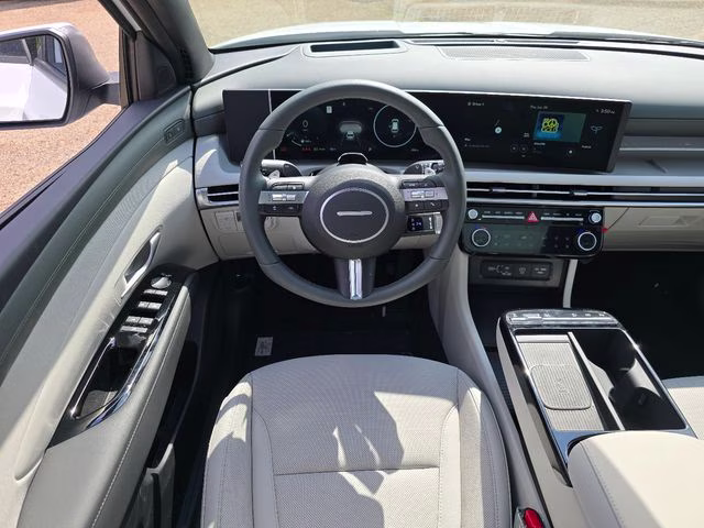 2026 Creamy White Pearl Hyundai Tucson Hybrid Limited AWD SUV