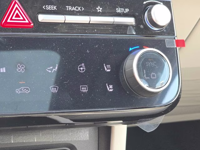2026 Creamy White Pearl Hyundai Tucson Hybrid Limited AWD SUV