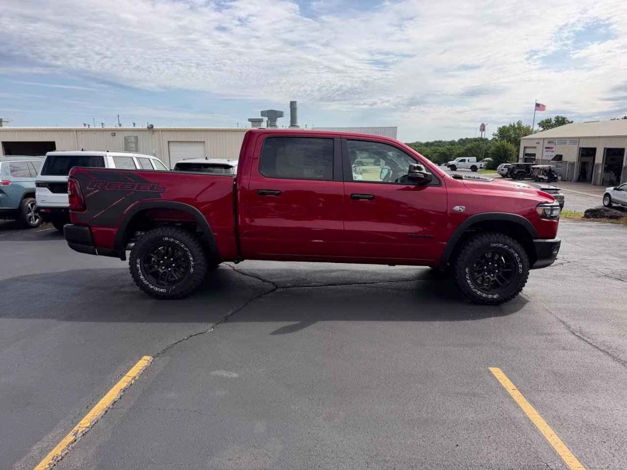 2026 Delmonico Red Pearlcoat Ram 1500 Rebel 4X4 Truck