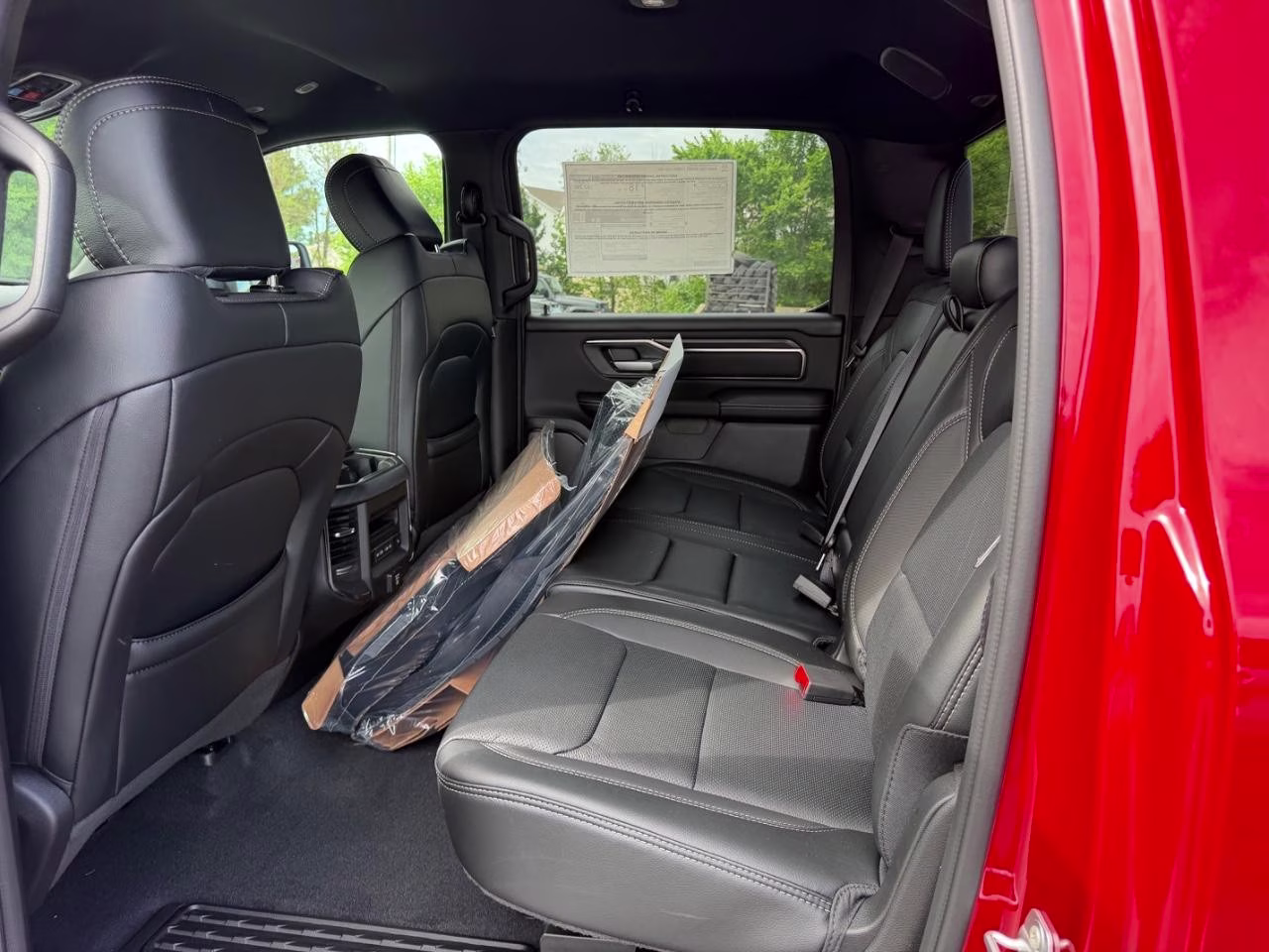 2026 Delmonico Red Pearlcoat Ram 1500 Rebel 4X4 Truck