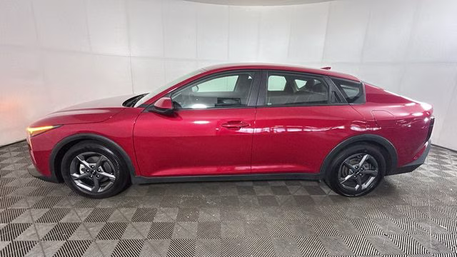 2025 Currant Red Kia K4 LXS FWD Sedan