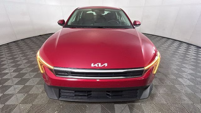 2025 Currant Red Kia K4 LXS FWD Sedan