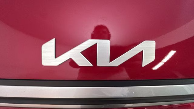 2025 Currant Red Kia K4 LXS FWD Sedan