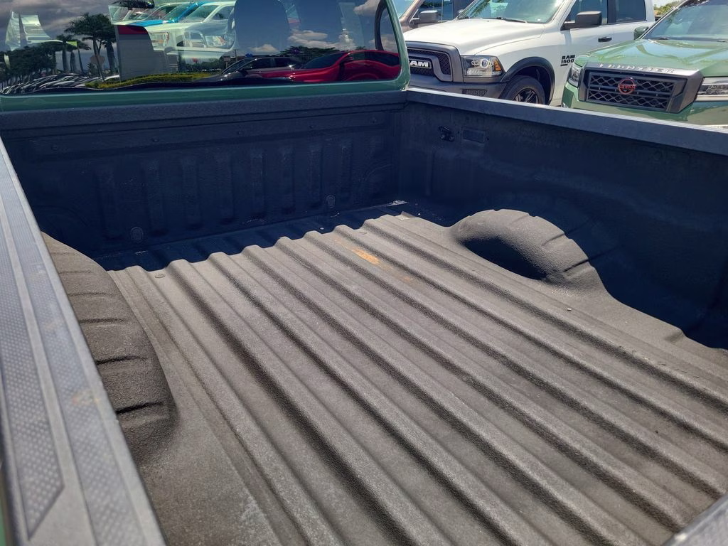 2023 Tactical Green Metallic Nissan Frontier SV 4X4 Truck