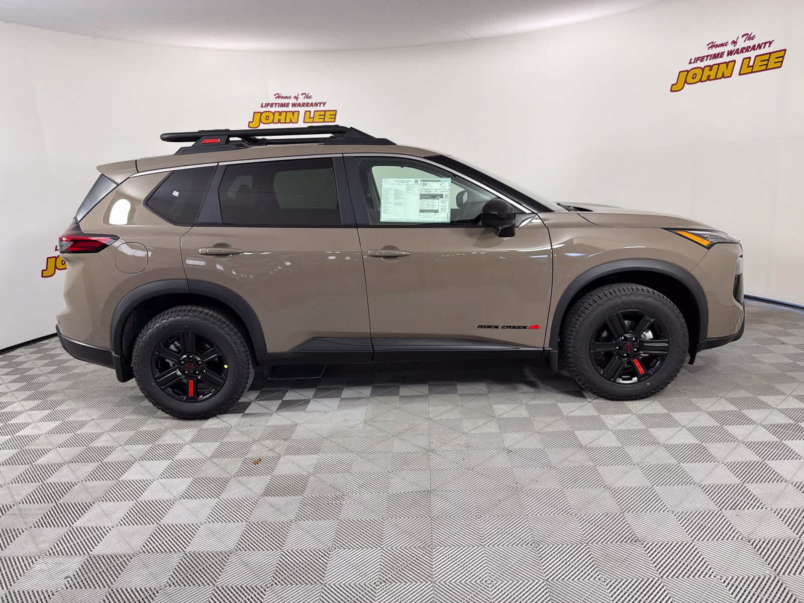 2026 Baja Storm Metallic Nissan Rogue Rock Creek AWD SUV