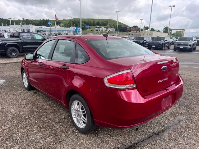2010 Red Ford Focus SE FWD Sedan
