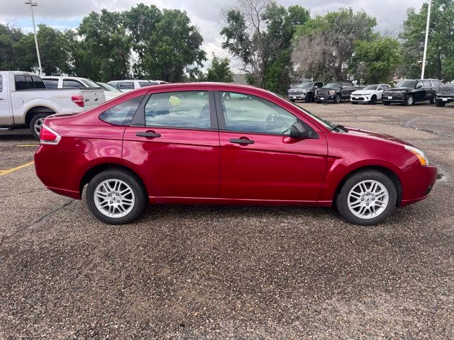 2010 Red Ford Focus SE FWD Sedan