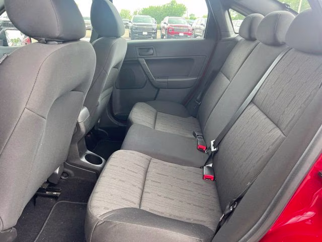 2010 Red Ford Focus SE FWD Sedan