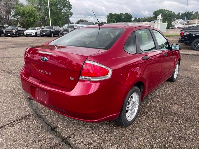 2010 Red Ford Focus SE FWD Sedan