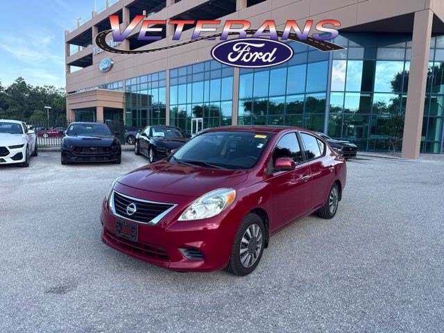 2014 Red Brick Nissan Versa SV FWD Sedan