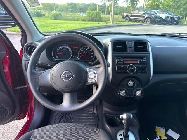 2014 Red Brick Nissan Versa SV FWD Sedan