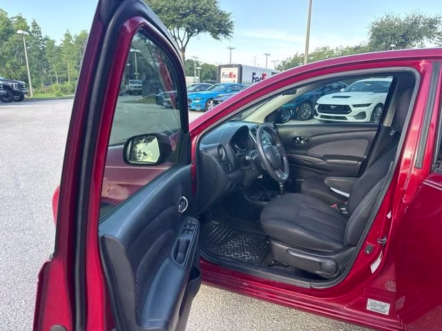2014 Red Brick Nissan Versa SV FWD Sedan
