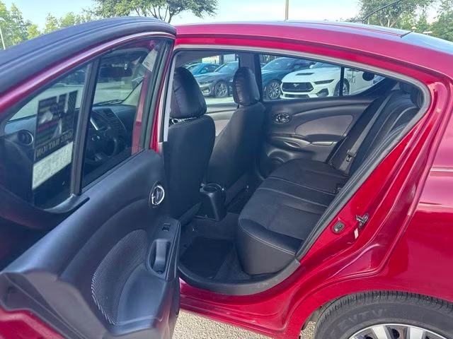 2014 Red Brick Nissan Versa SV FWD Sedan