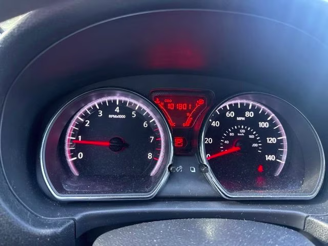 2014 Red Brick Nissan Versa SV FWD Sedan