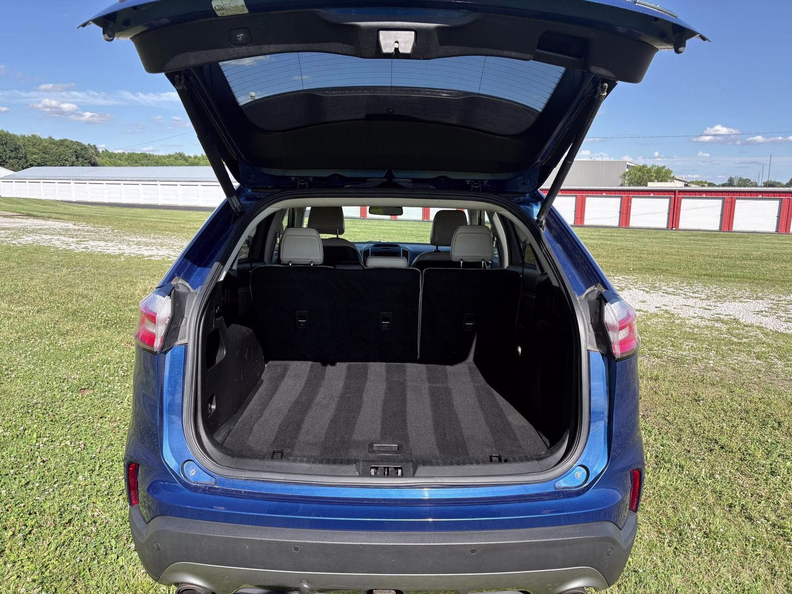 2020 Atlas Blue Ford Edge Titanium AWD SUV
