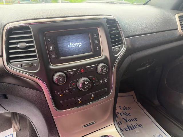 2014 Deep Cherry Red Crystal Jeep Grand Cherokee Laredo 4X4 SUV