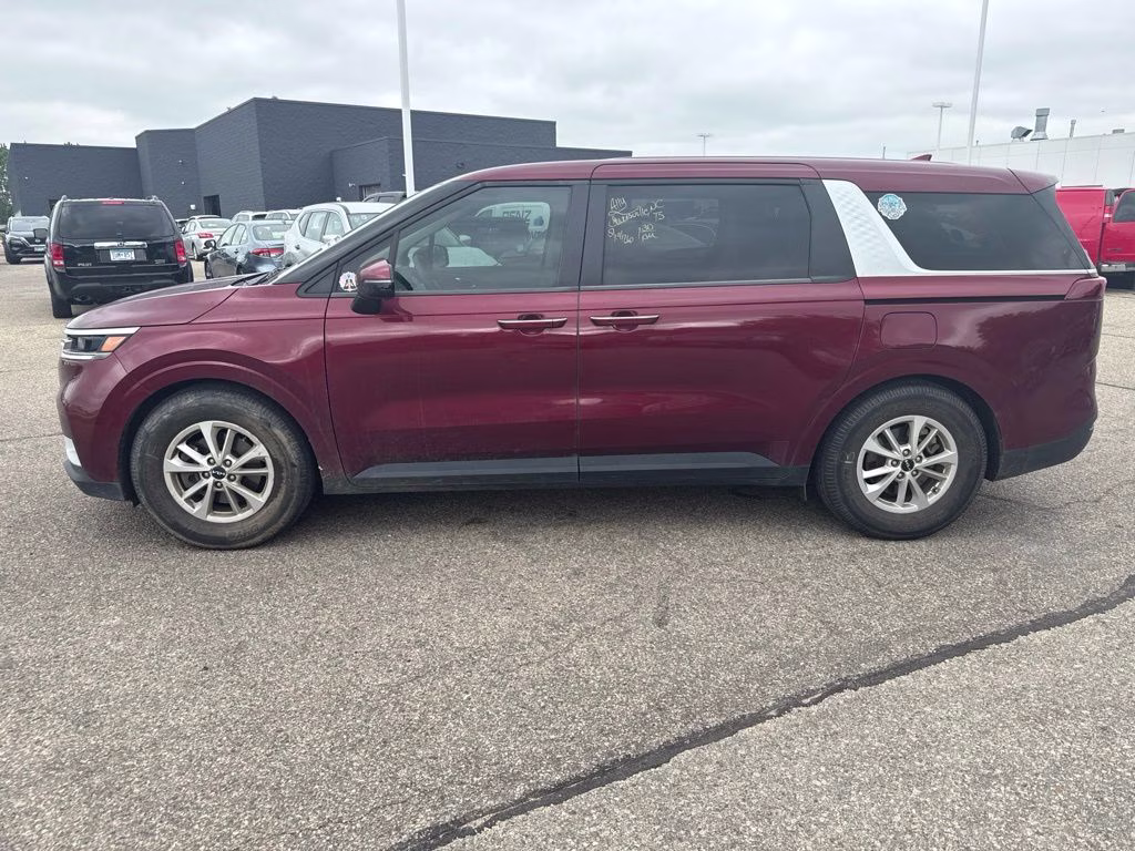 2024 Flare Red Kia Carnival LX Seat Package FWD Van