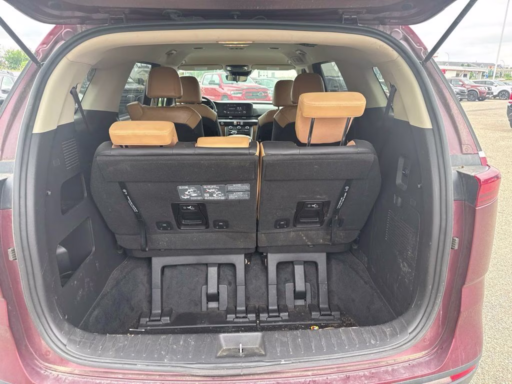 2024 Flare Red Kia Carnival LX Seat Package FWD Van