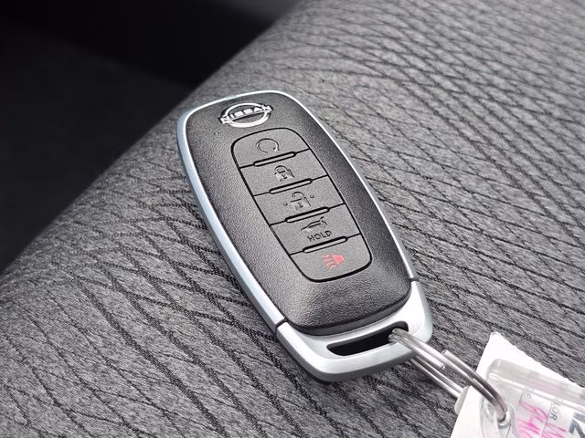 2026 Everest White Pearl Tricoat Nissan Rogue SV AWD SUV