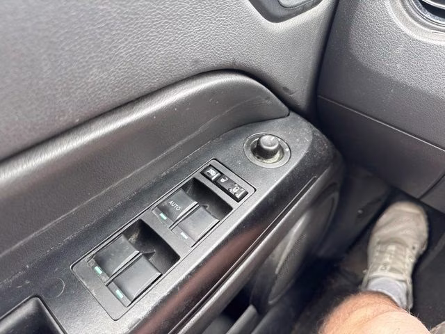 2011 Bright Silver Metallic Clearcoat Jeep Compass Base 4X4 SUV