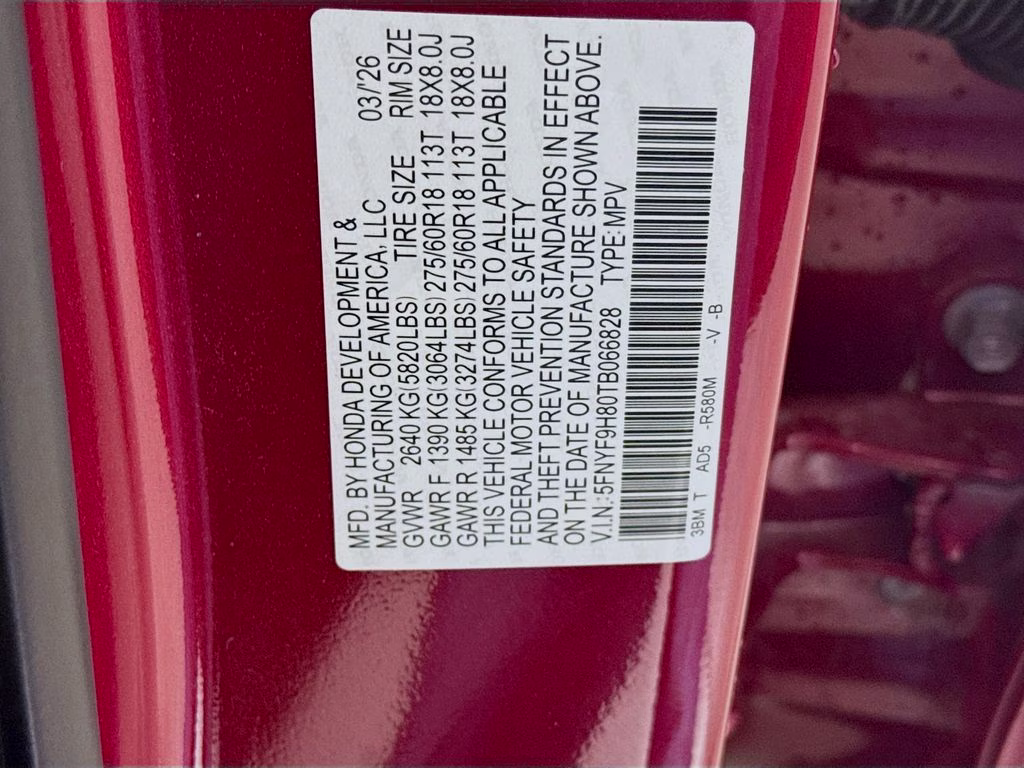 2026 Radiant Red Metallic II Honda Passport TrailSport Elite AWD SUV