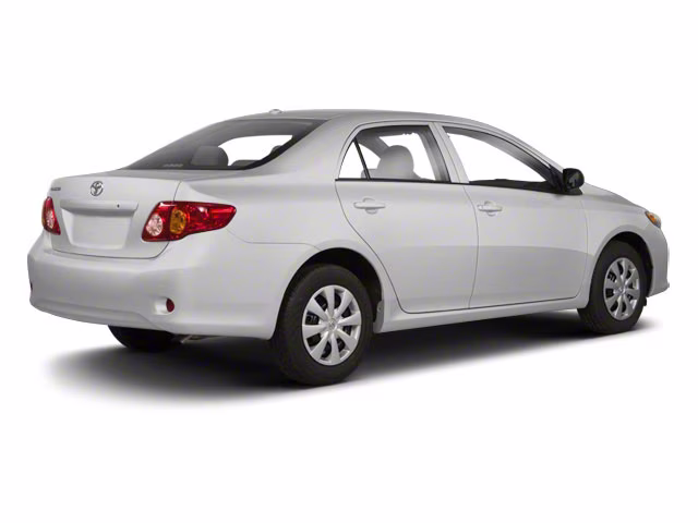 2010 Classic Silver Metallic Toyota Corolla LE FWD