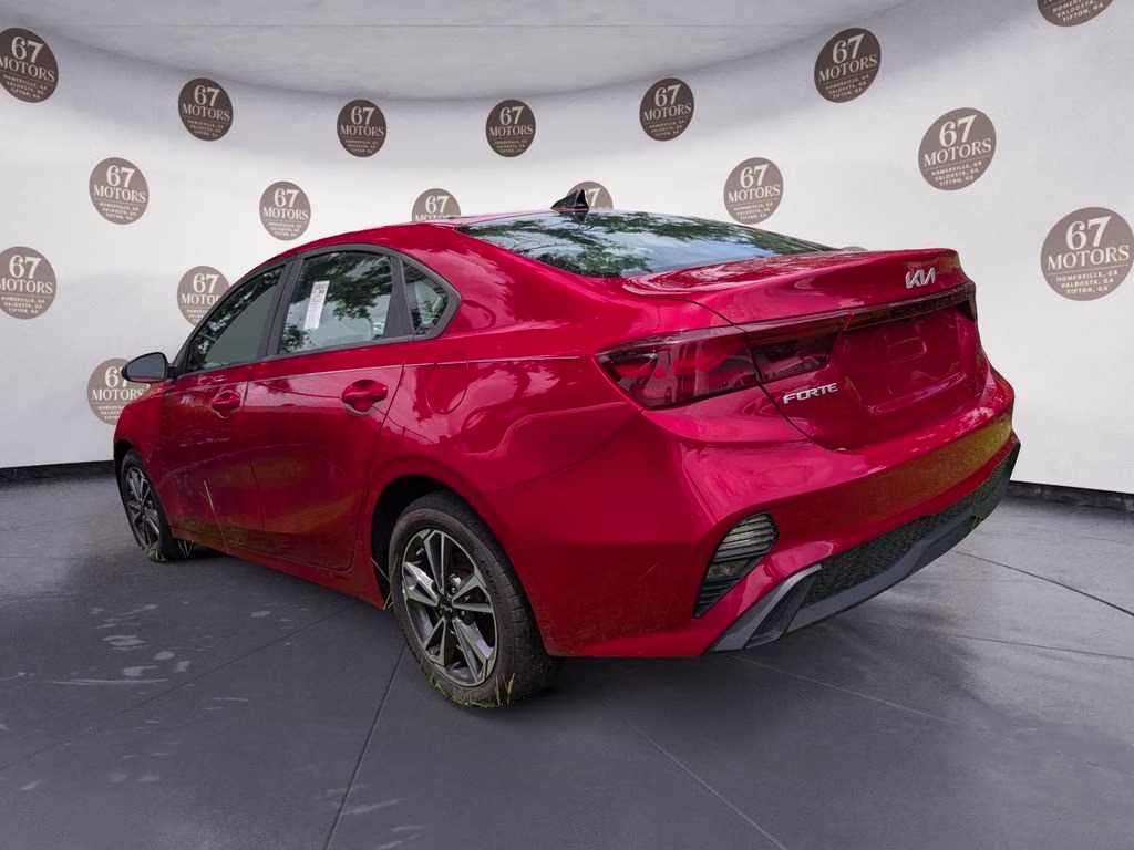 2024 Currant Red Kia Forte LXS FWD Sedan