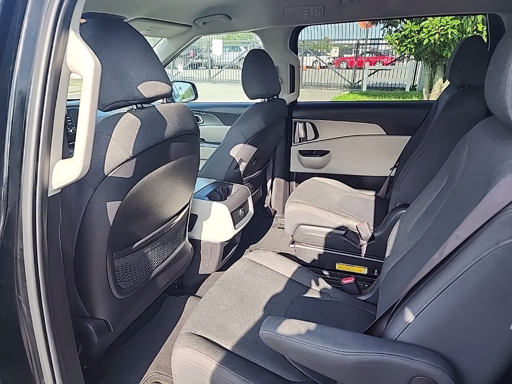 2022 Aurora Black Kia Carnival LX FWD Van