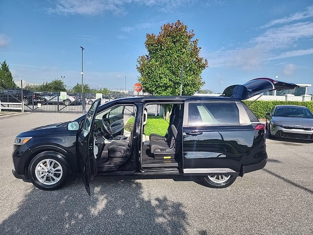 2022 Aurora Black Kia Carnival LX FWD Van
