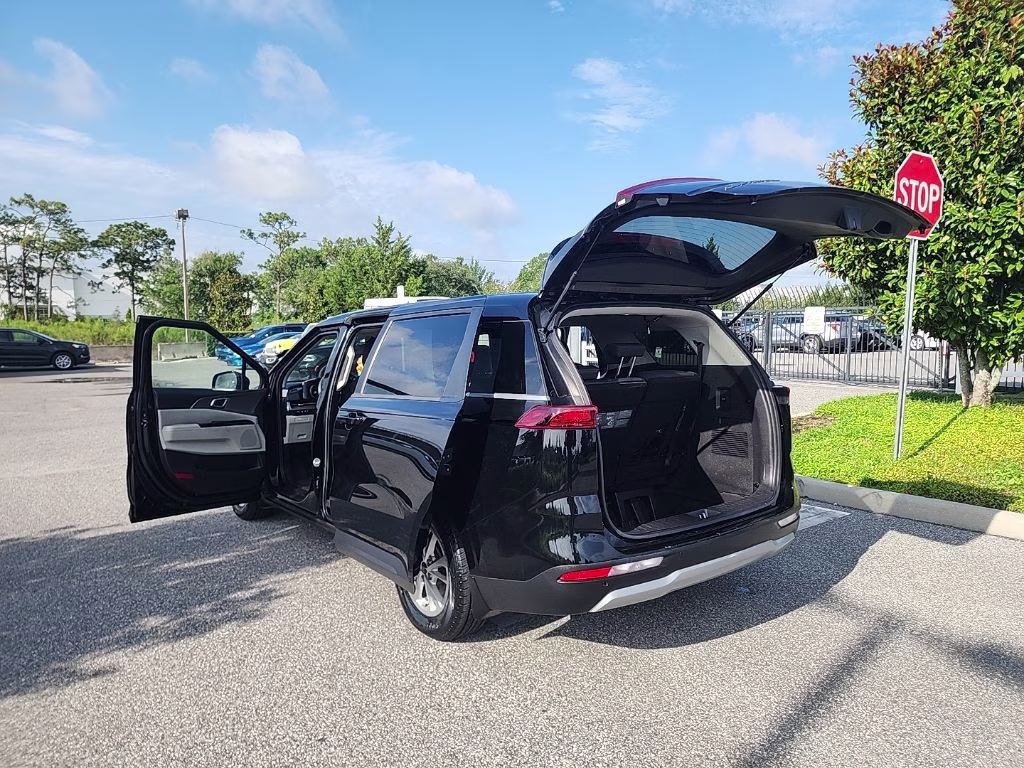2022 Aurora Black Kia Carnival LX FWD Van
