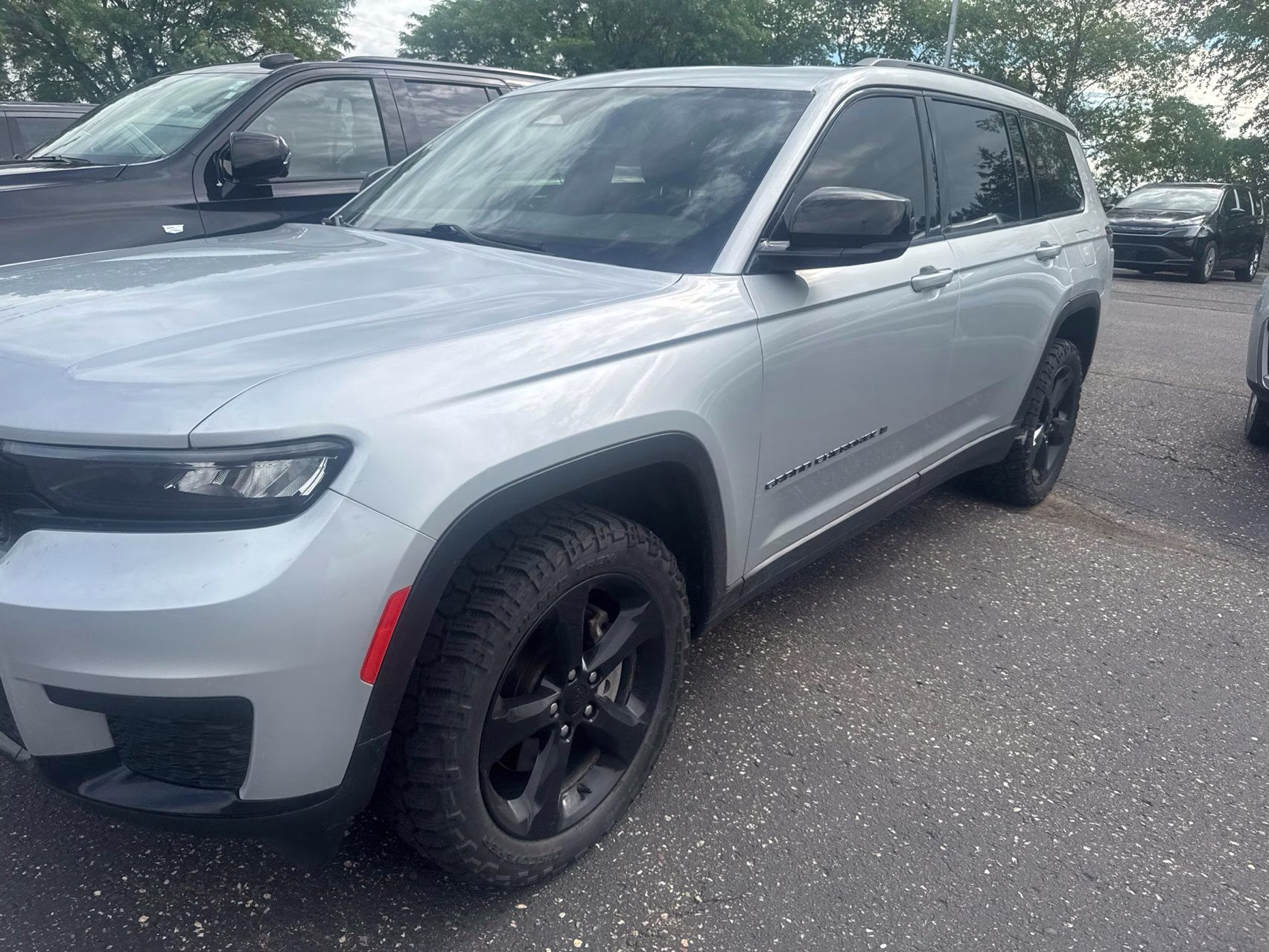 2023 Silver Zynith Jeep Grand Cherokee L Altitude 4X4 SUV