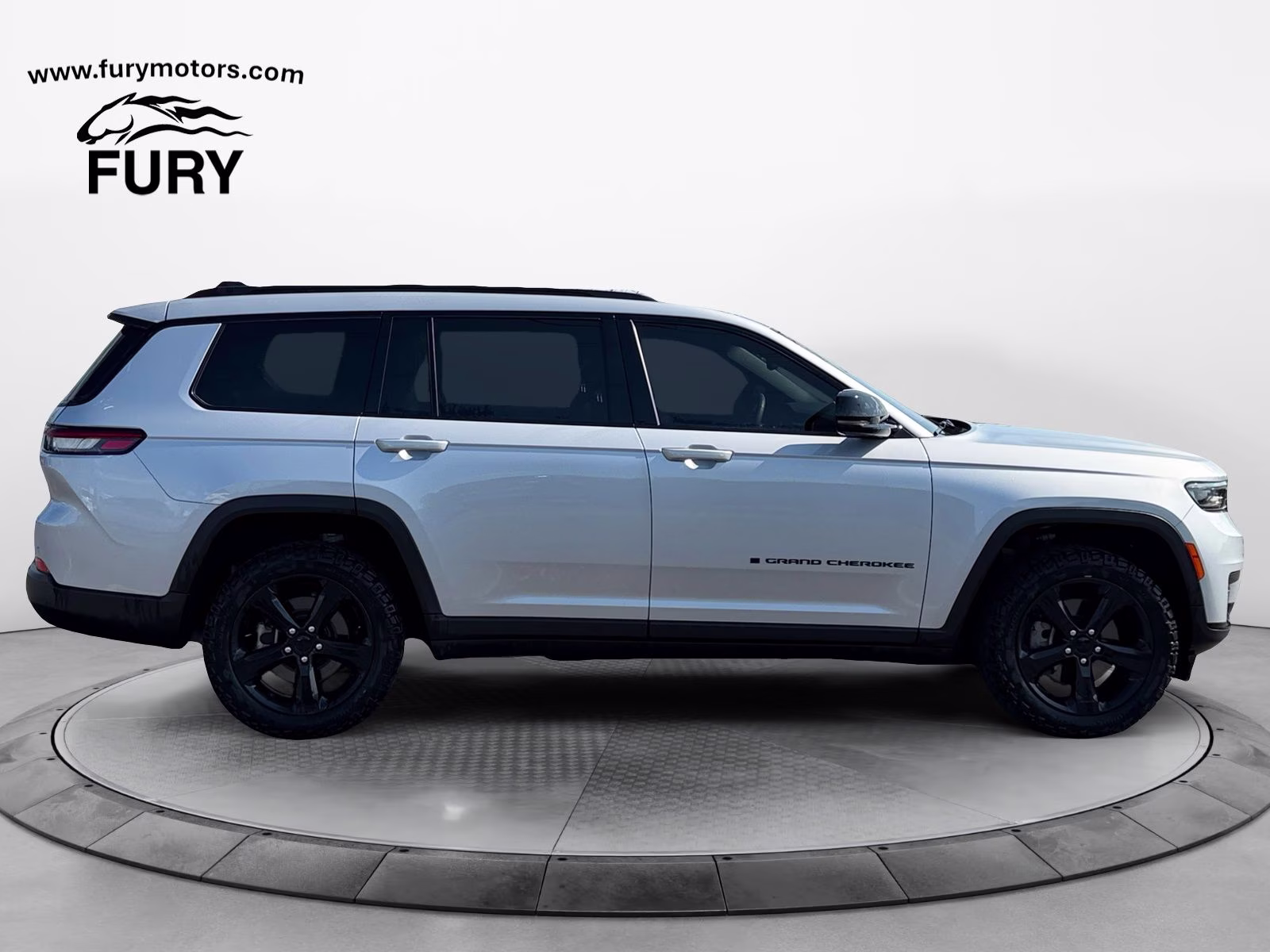 2023 Silver Zynith Jeep Grand Cherokee L Altitude 4X4 SUV