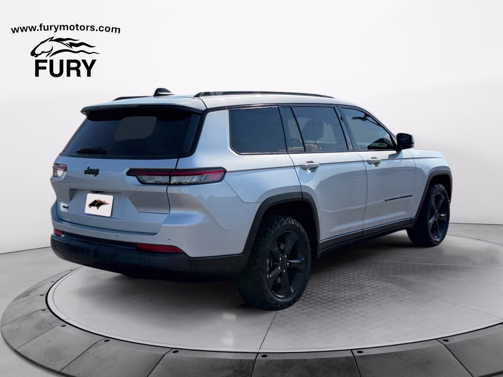 2023 Silver Zynith Jeep Grand Cherokee L Altitude 4X4 SUV