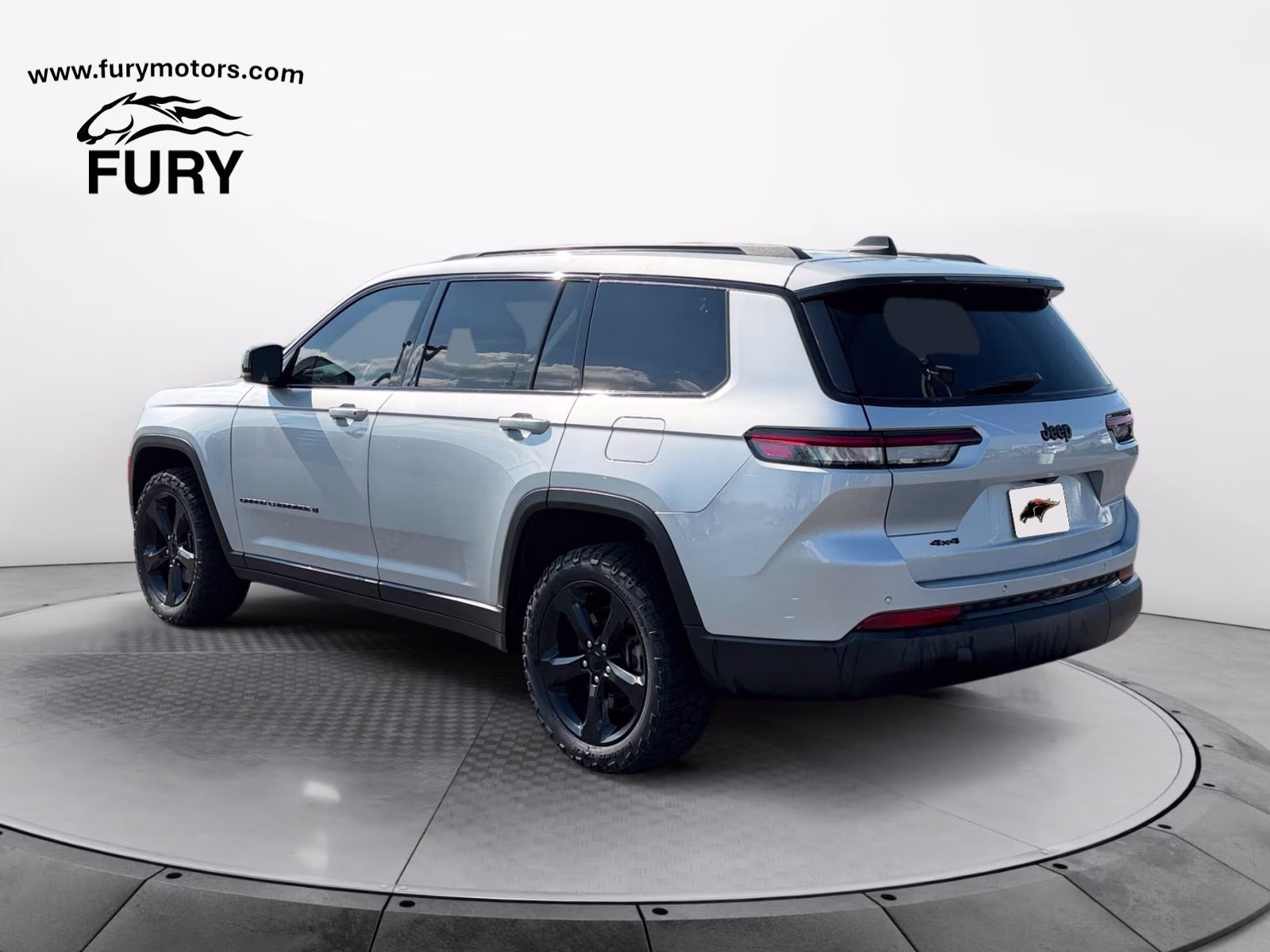 2023 Silver Zynith Jeep Grand Cherokee L Altitude 4X4 SUV