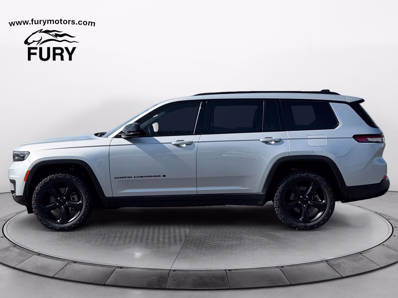 2023 Silver Zynith Jeep Grand Cherokee L Altitude 4X4 SUV