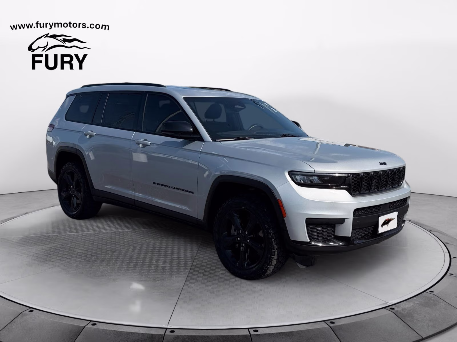 2023 Silver Zynith Jeep Grand Cherokee L Altitude 4X4 SUV