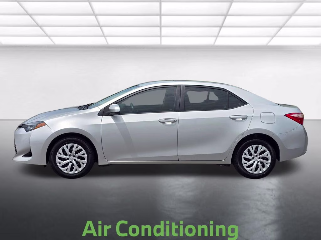 2019 Classic Silver Metallic Toyota Corolla LE FWD Sedan