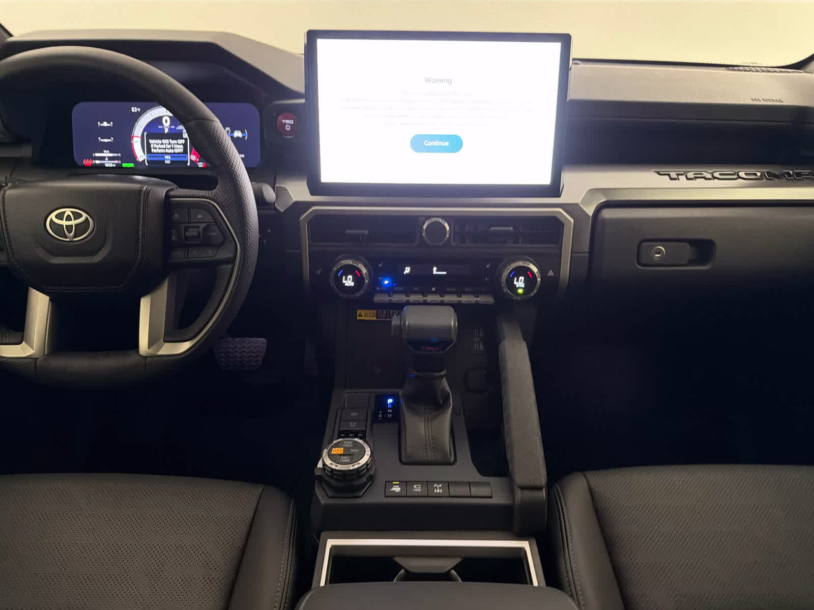 2024 Bronze Oxide Toyota Tacoma TRD Off Road Hybrid 4X4 Truck