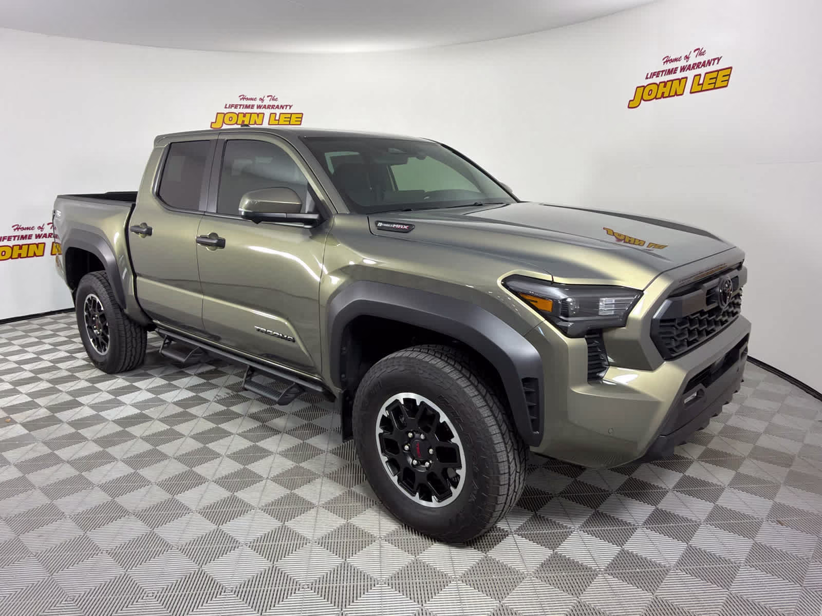 2024 Bronze Oxide Toyota Tacoma TRD Off Road Hybrid 4X4 Truck