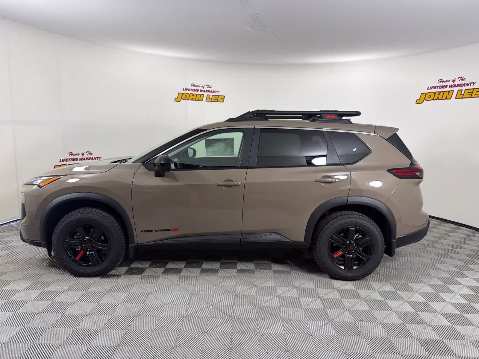 2026 Baja Storm Metallic Nissan Rogue Rock Creek AWD SUV