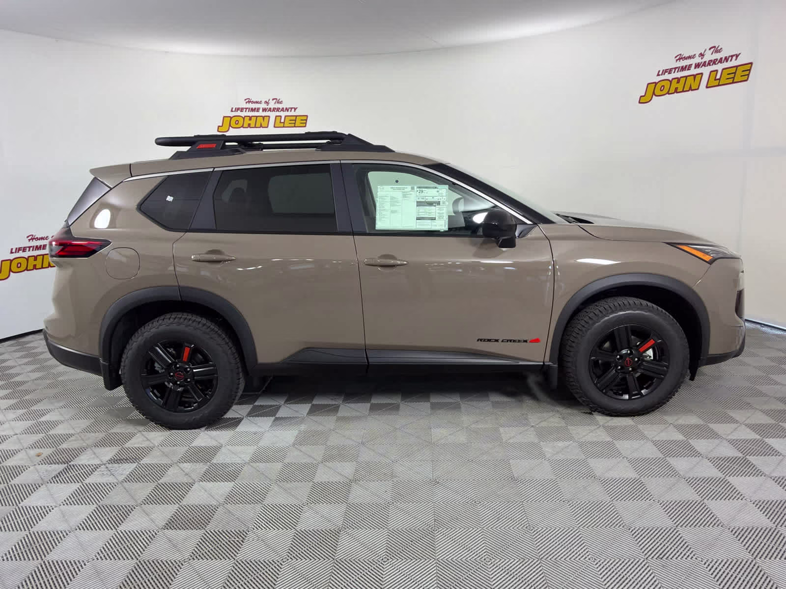 2026 Baja Storm Metallic Nissan Rogue Rock Creek AWD SUV