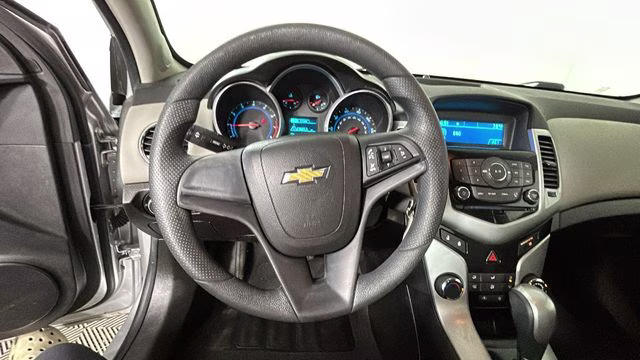 2014 Silver Ice Metallic Chevrolet Cruze LS FWD Sedan
