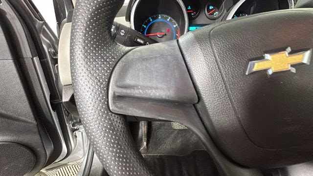 2014 Silver Ice Metallic Chevrolet Cruze LS FWD Sedan