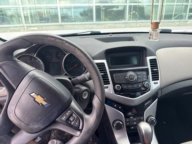 2014 Silver Ice Metallic Chevrolet Cruze LS FWD Sedan