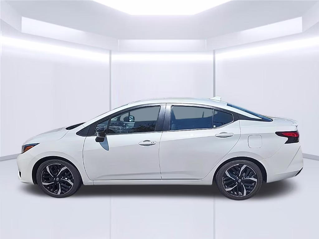 2024 Aspen White Tricoat Nissan Versa 1.6 SR FWD Sedan