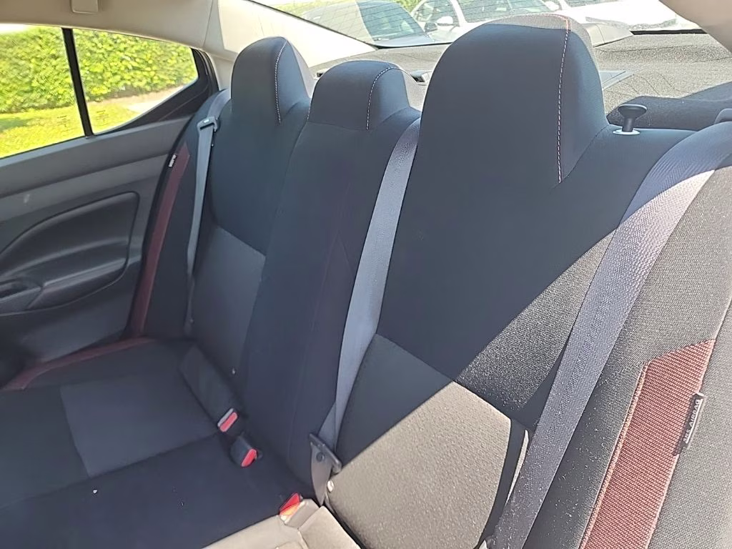 2024 Aspen White Tricoat Nissan Versa 1.6 SR FWD Sedan