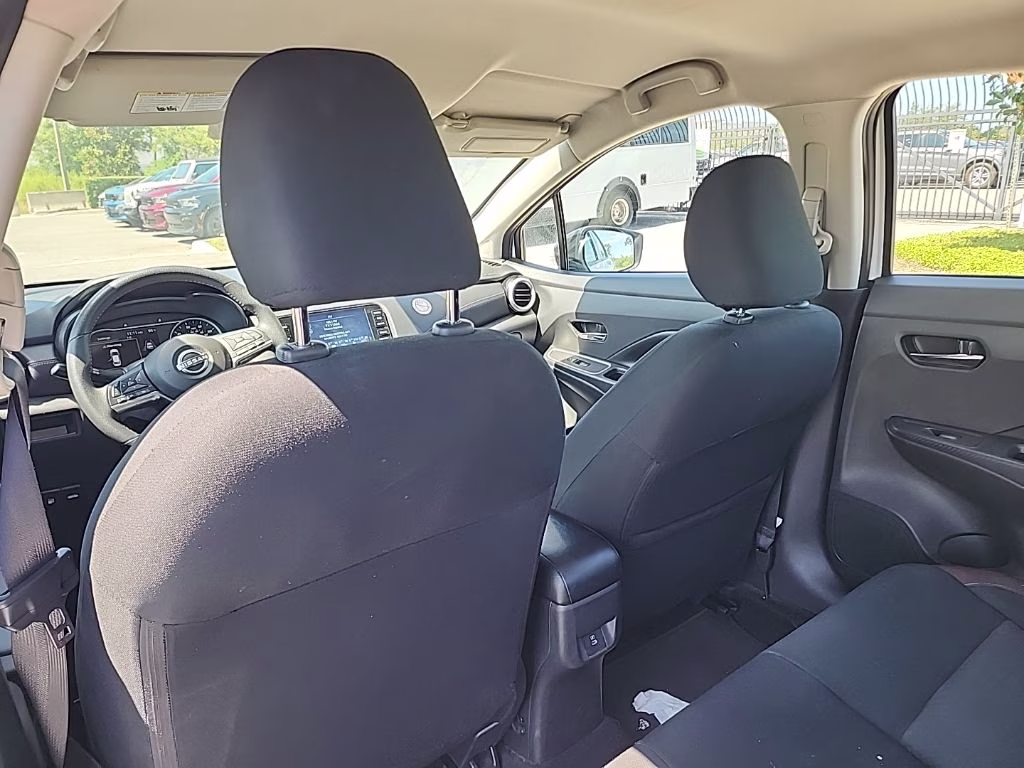2024 Aspen White Tricoat Nissan Versa 1.6 SR FWD Sedan