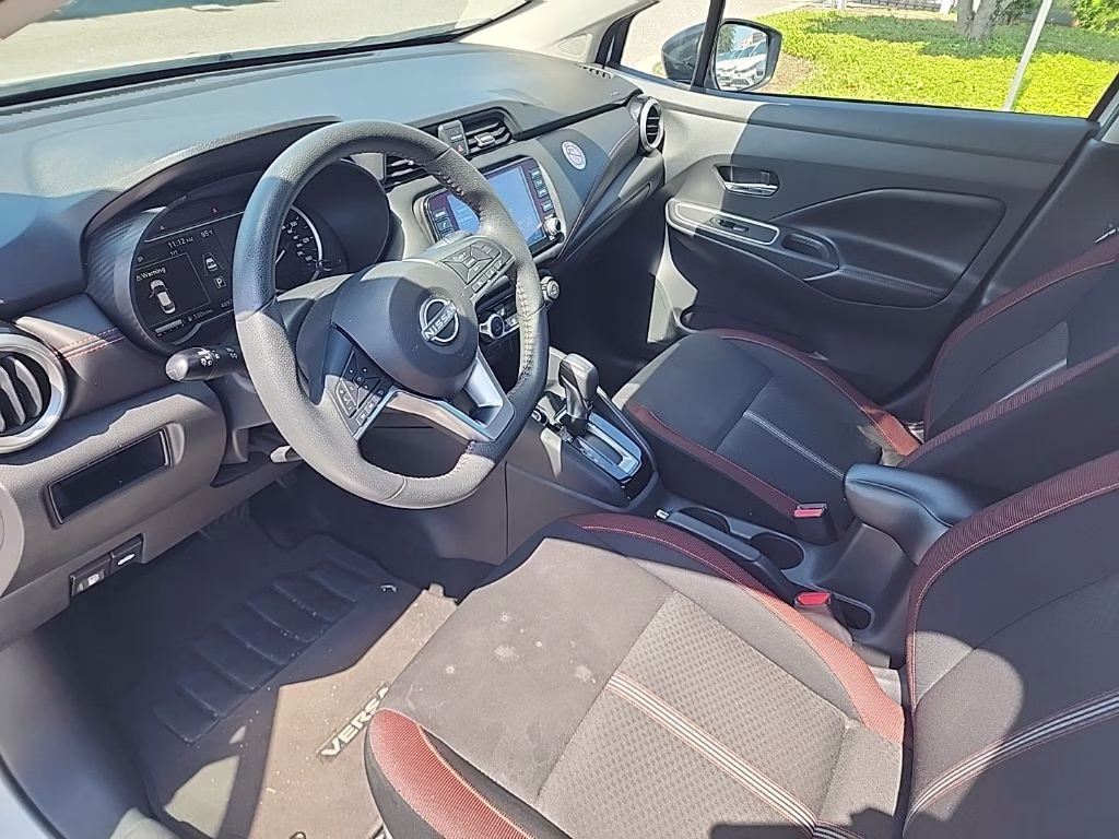 2024 Aspen White Tricoat Nissan Versa 1.6 SR FWD Sedan