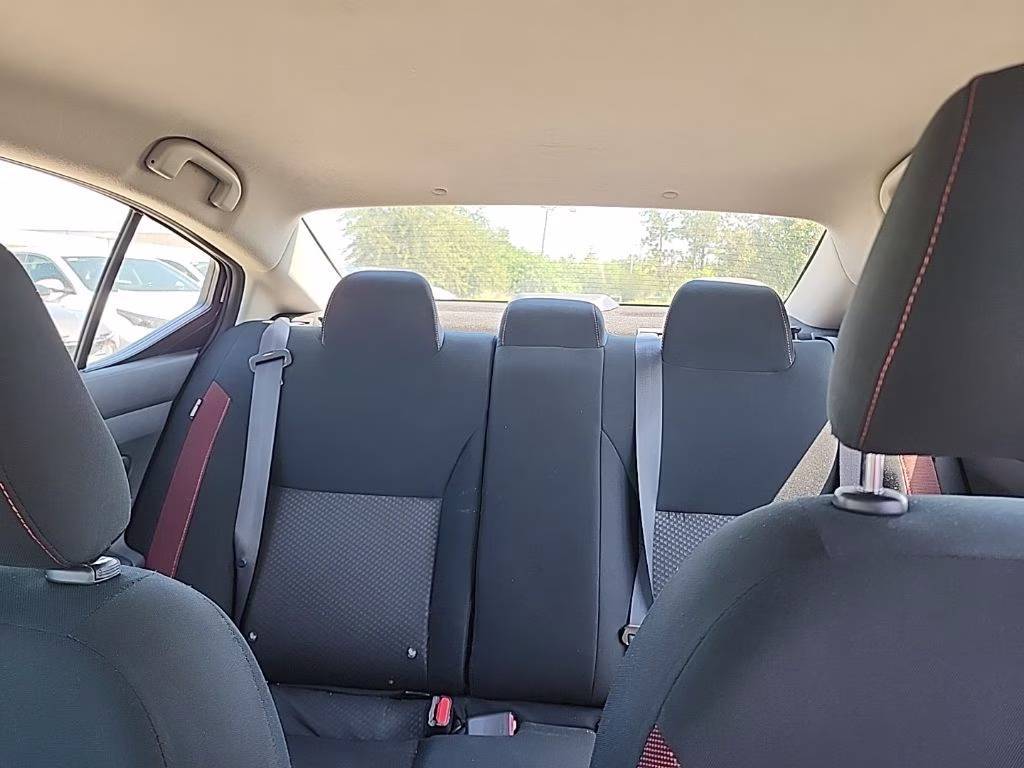 2024 Aspen White Tricoat Nissan Versa 1.6 SR FWD Sedan